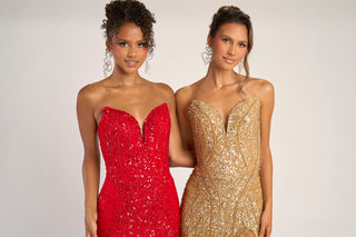 Two women in red and gold sequin gowns