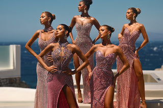 Women in pink and silver formal gowns