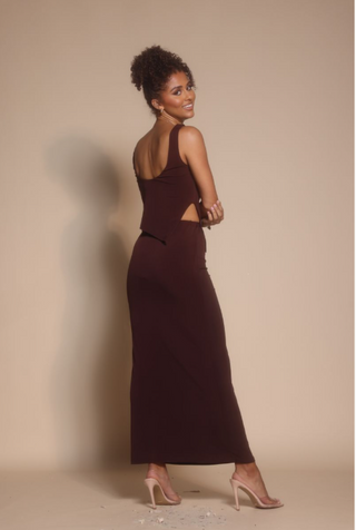 Woman in maroon dress, Screenshot 2025-10-30