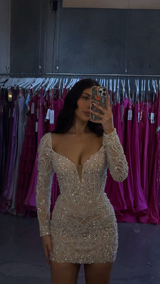 Woman in beaded dress, selfie, WhatsApp image