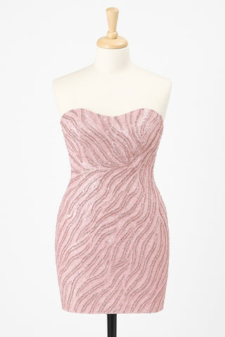 Pink beaded strapless dress on mannequin