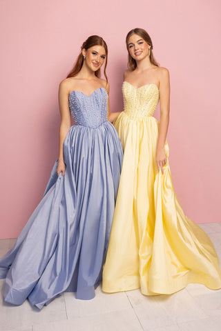 Two women in formal gowns