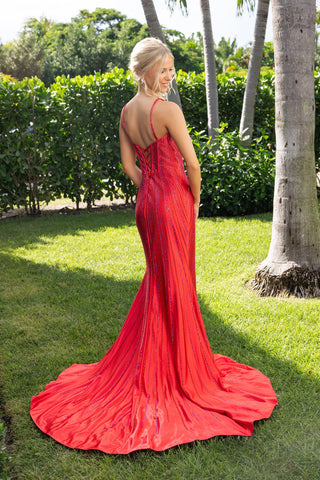 Woman in red watermelon-colored gown