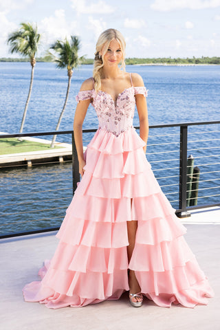 Pink tiered formal dress with open shoulders
