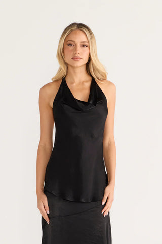 Bianca in a black halter top