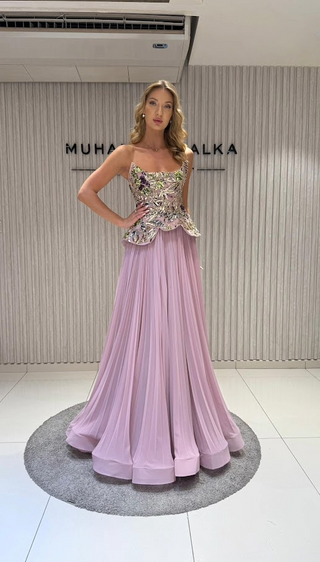 Woman in a formal lavender dress.