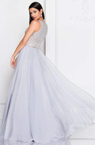 Elegant gown with beaded bodice and flowing skirt.