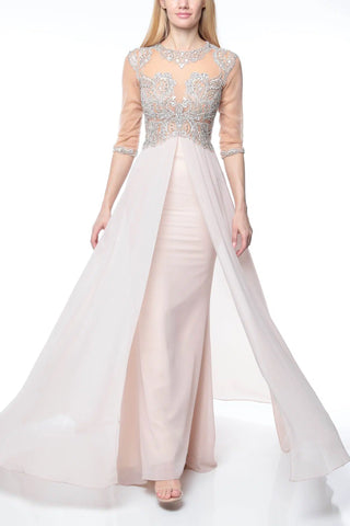 Elegant evening gown with sheer overlay.