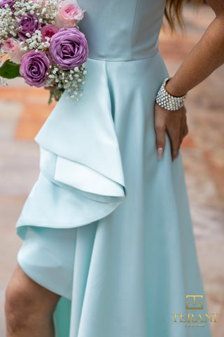 Pistachio green dress with flowers and bracelet