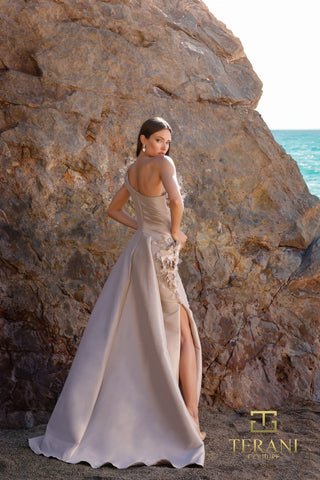 Elegant gown 252E5116_2, posing near rock formation and ocean.