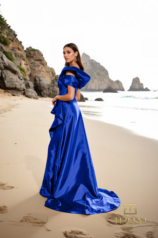 Royal blue evening gown on beach
