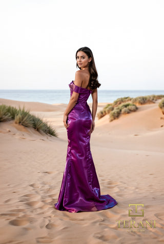 Plum evening gown on woman at beach