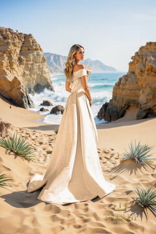 Rose gold gown on beach