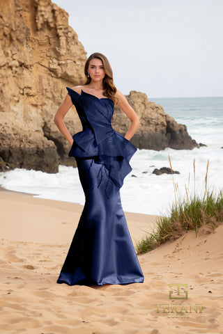 Navy blue formal gown on beach