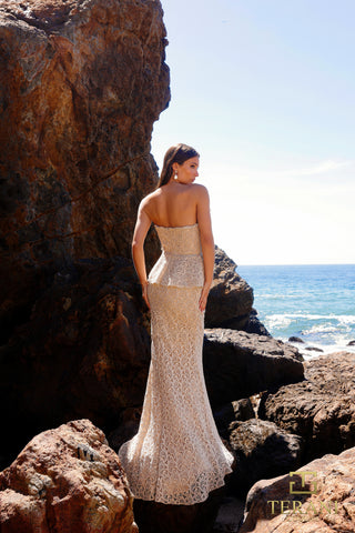 Champagne lace gown on woman by the sea