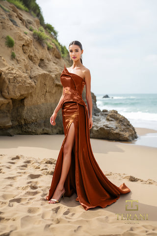 Cognac colored one-shoulder gown on beach