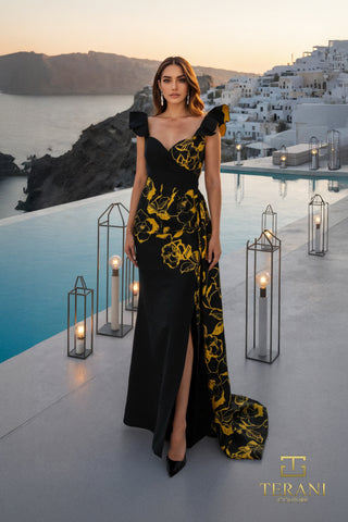 Woman in elegant black and yellow floral gown, Santorini