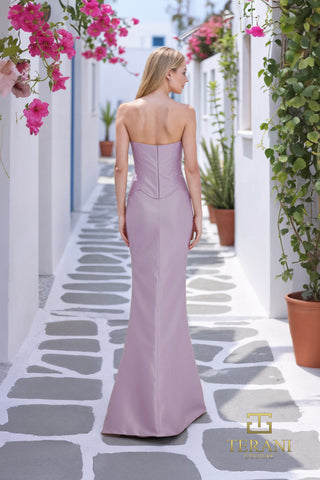 Orchid-colored gown in alleyway