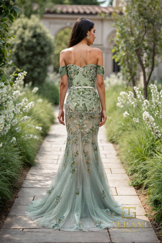 Woman in green floral gown, back view