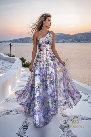 Woman in blue and purple floral dress