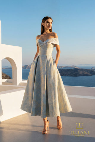 Woman in off-shoulder dress outdoors.