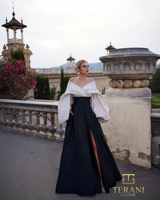 Woman in dress standing outdoors.