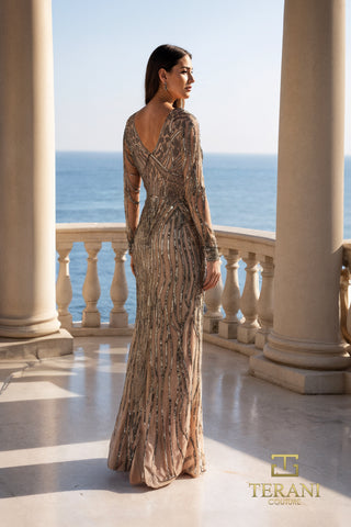 Champagne silver beaded gown on balcony overlooking ocean