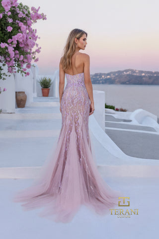 Siren style pink gown with train, overlooking sea.