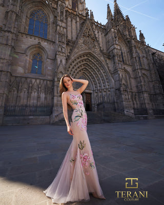 Woman in floral gown in front of Barcelona cathedral