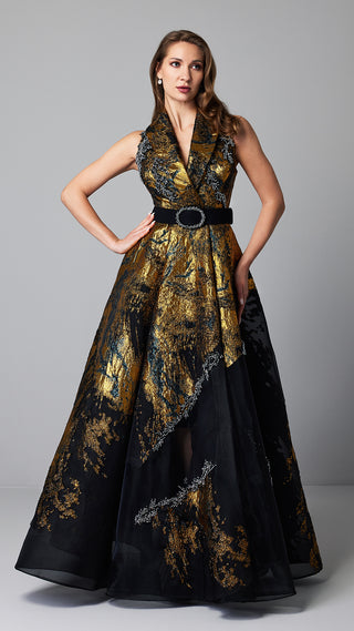 Woman in gold and black evening gown.