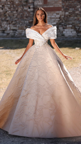 Woman in white off-the-shoulder gown.