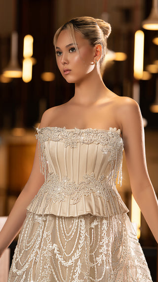 Woman in a strapless formal dress.