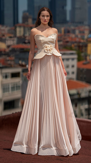 Woman in 6096W-1 blush pleated gown