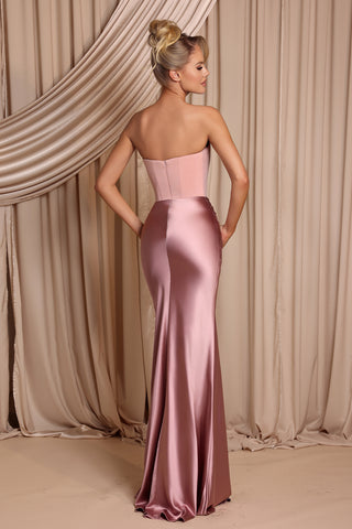 Woman in pink satin evening gown