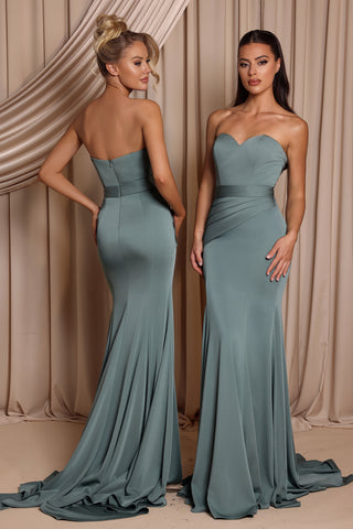 Two women in teal strapless formal gowns