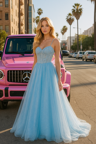 Woman in blue gown poses by pink SUV.