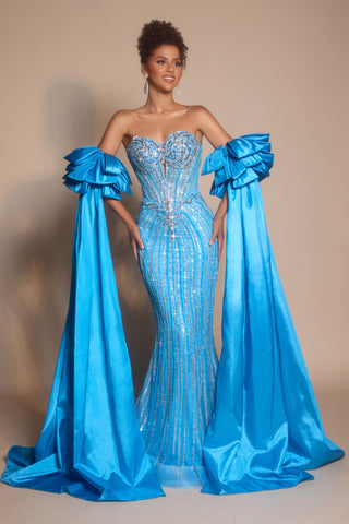 Teal evening gown with dramatic sleeves