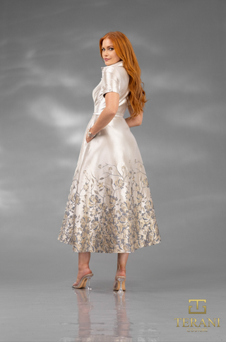 Screenshot of woman in floral dress, Nov 11, 2025