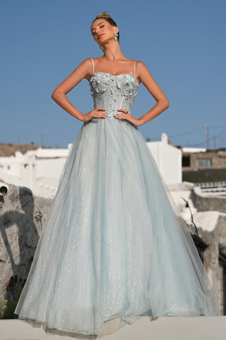 Woman in light blue formal gown, Oct 29, 2025