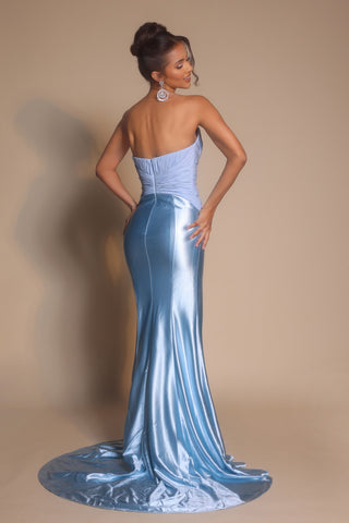 Woman in ice blue formal gown