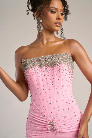 Pink beaded gown on model