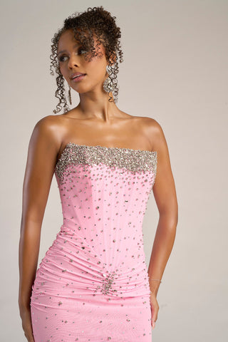 Woman in pink strapless gown, XO059