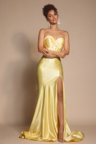 Yellow strapless evening gown with high slit.