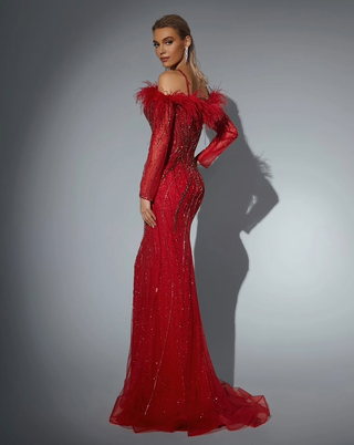 Woman in a red feathered evening gown.